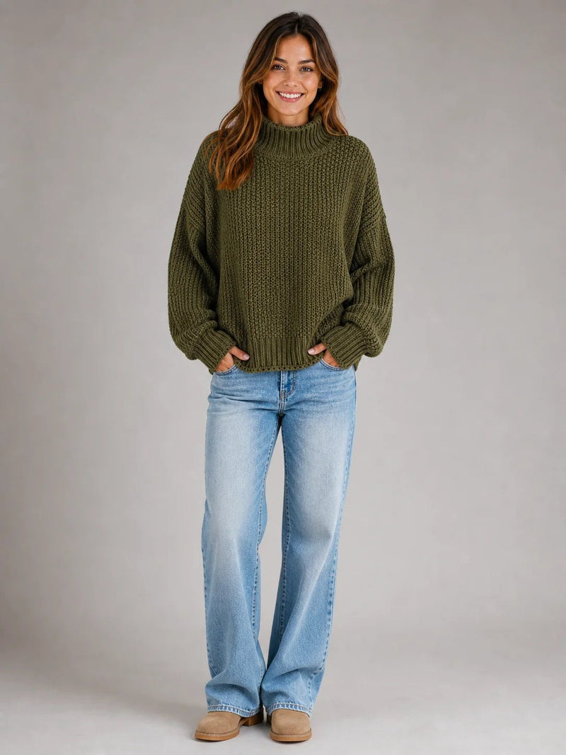 Sofaine Hazel chunky turtleneck knit sweater in olive green, styled full look with jeans