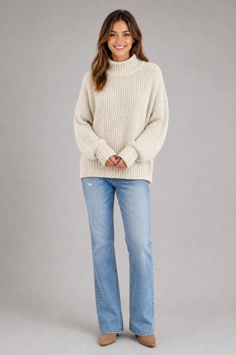 Sofaine Hazel chunky turtleneck knit sweater in cream, styled full look with jeans