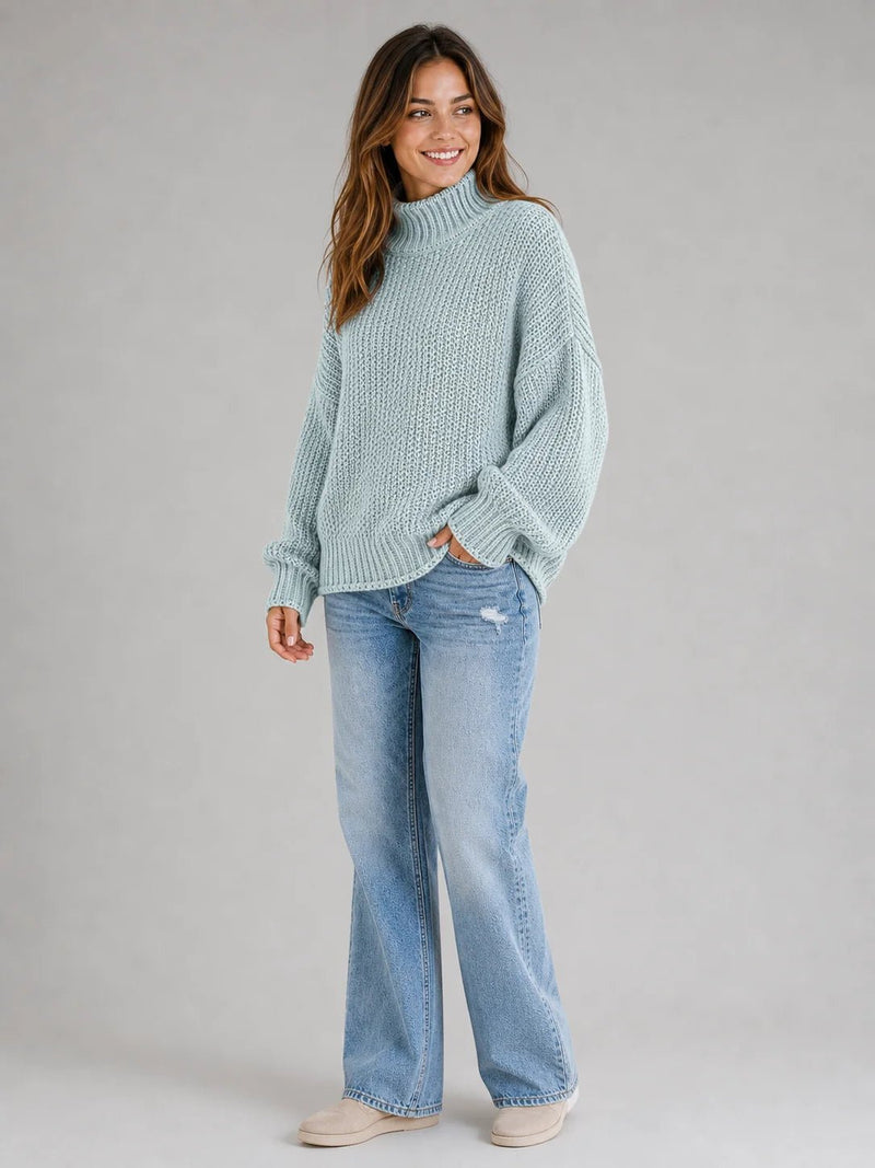 Sofaine Hazel chunky turtleneck knit sweater in light blue, styled full look with jeans