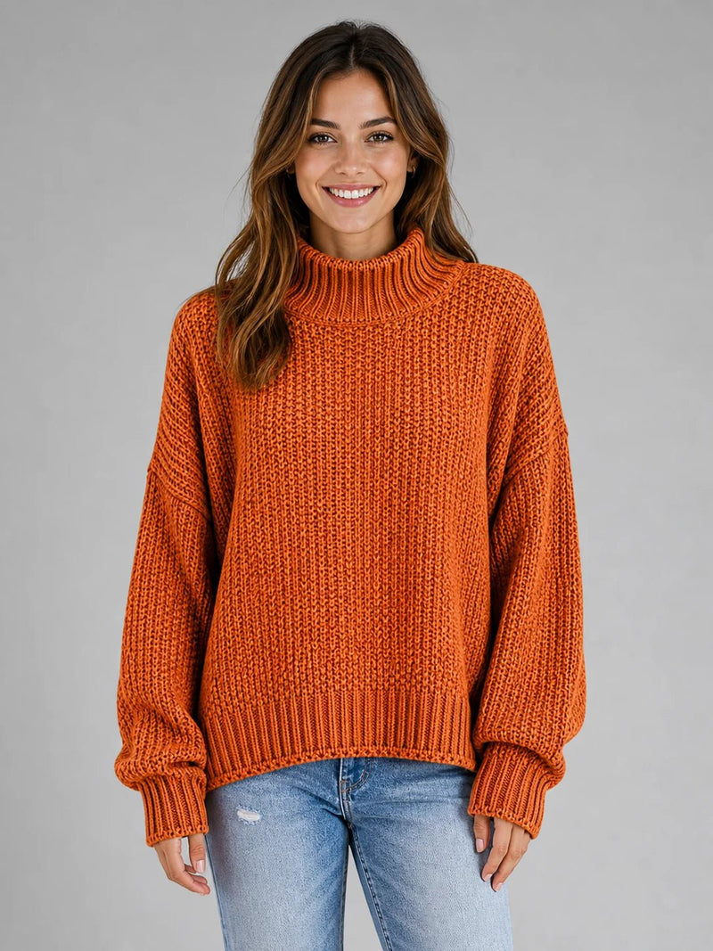 Sofaine Hazel chunky ribbed turtleneck knit pullover sweater in burnt orange, worn front view