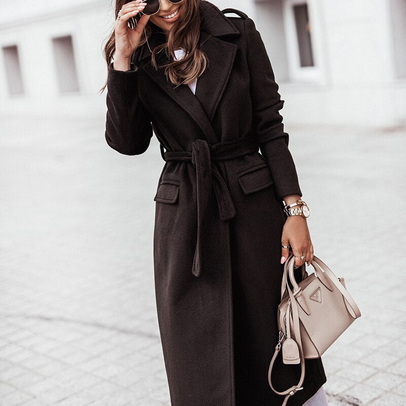 Long Belted Coat for Women with Wide Lapel and Tie Waist in Black, studio front view