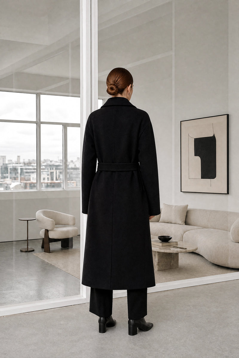 Isabelle | Belted Trench Coat in Black, studio back view