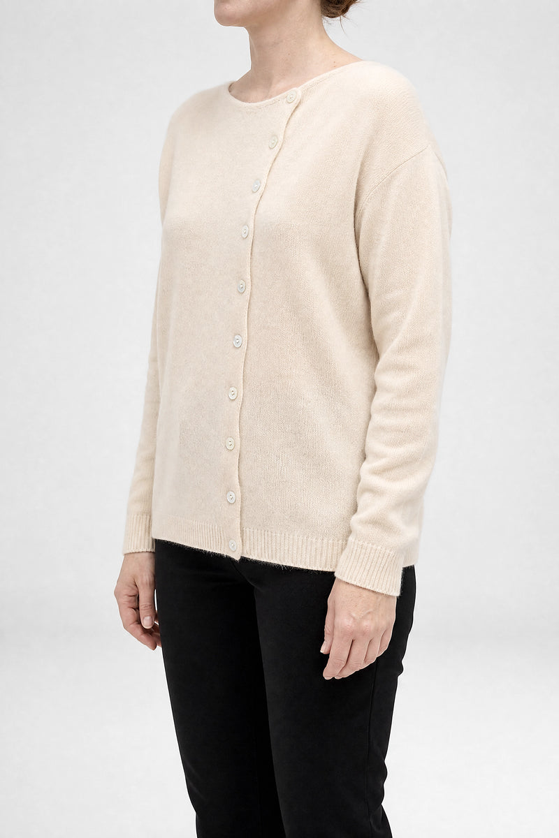 Sofaine Jenna cashmere-feel asymmetric cardigan sweater in Beige, side view studio shot