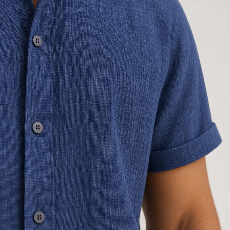 Sofaine Julian short-sleeve shirt in navy blue, fabric close-up of textured weave and buttons
