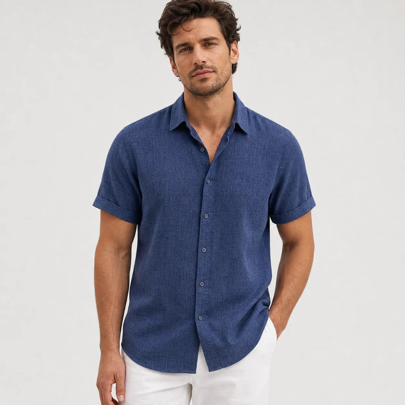 Sofaine Julian short-sleeve button-up shirt in navy blue with rolled cuffs, worn front view