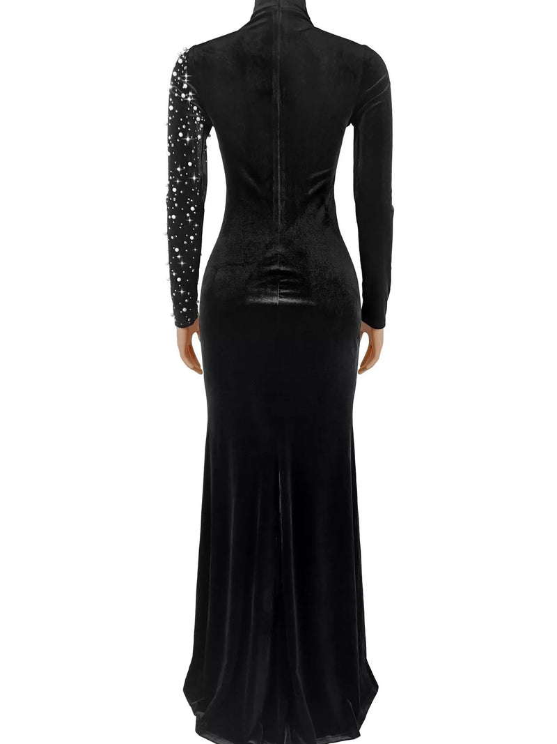 Long Sleeve Velvet Evening Gown for Women with Rhinestones and Mermaid Hem in Black, back view on form