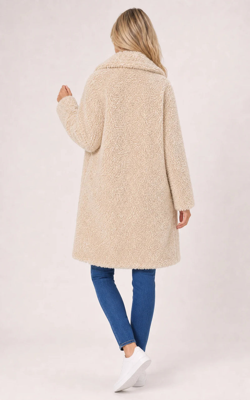 Sofaine Layla longline teddy fleece coat in Apricot, worn back
