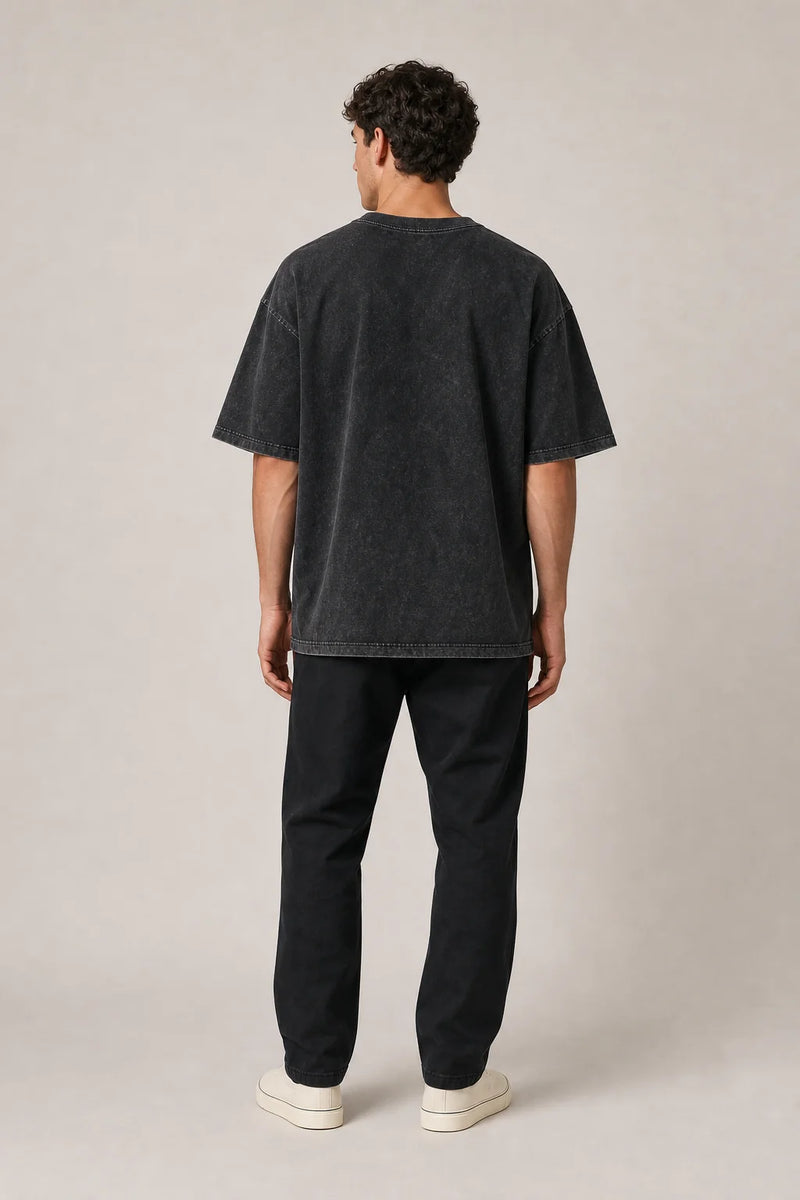 Sofaine Levi oversized acid-wash cotton crew-neck T-shirt in Black, worn back view