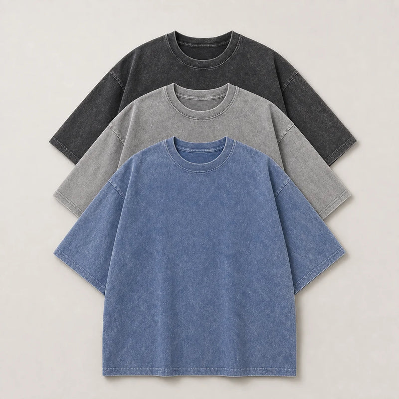 Sofaine Levi oversized acid-wash cotton crew-neck T-shirt 3-pack in Black Gray Blue, folded flat-lay