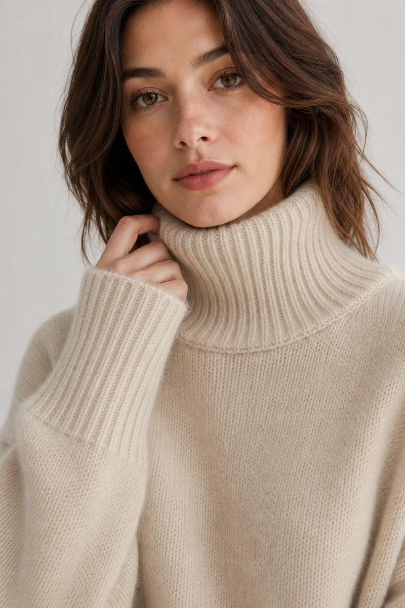 Sofaine Nora women's oversized cashmere turtleneck sweater in Beige, ribbed turtleneck and cuff detail