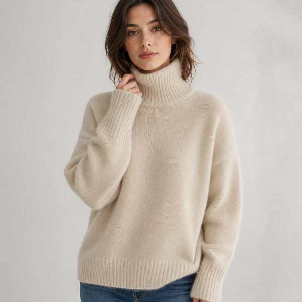 Sofaine Nora women's oversized cashmere turtleneck sweater in Beige, worn front hero