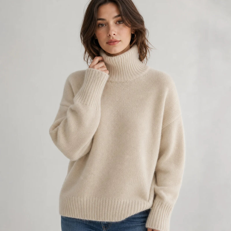 Sofaine Nora women's oversized cashmere turtleneck sweater in Beige, worn front hero