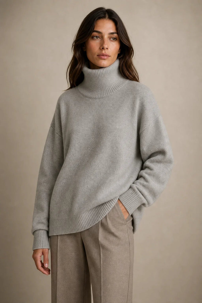 Sofaine Nova oversized knit turtleneck sweater in light grey, worn front view