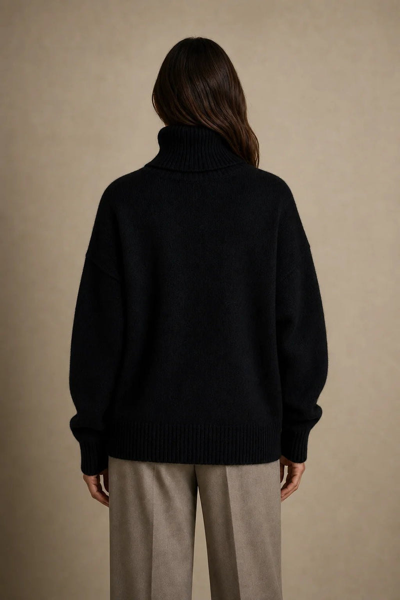 Sofaine Nova oversized knit turtleneck sweater in black, back view
