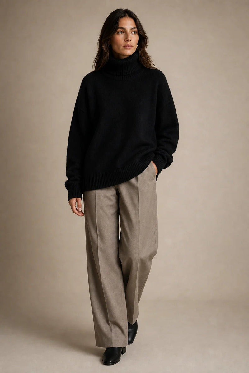 Sofaine Nova black knit turtleneck sweater styled with wide taupe trousers, full look
