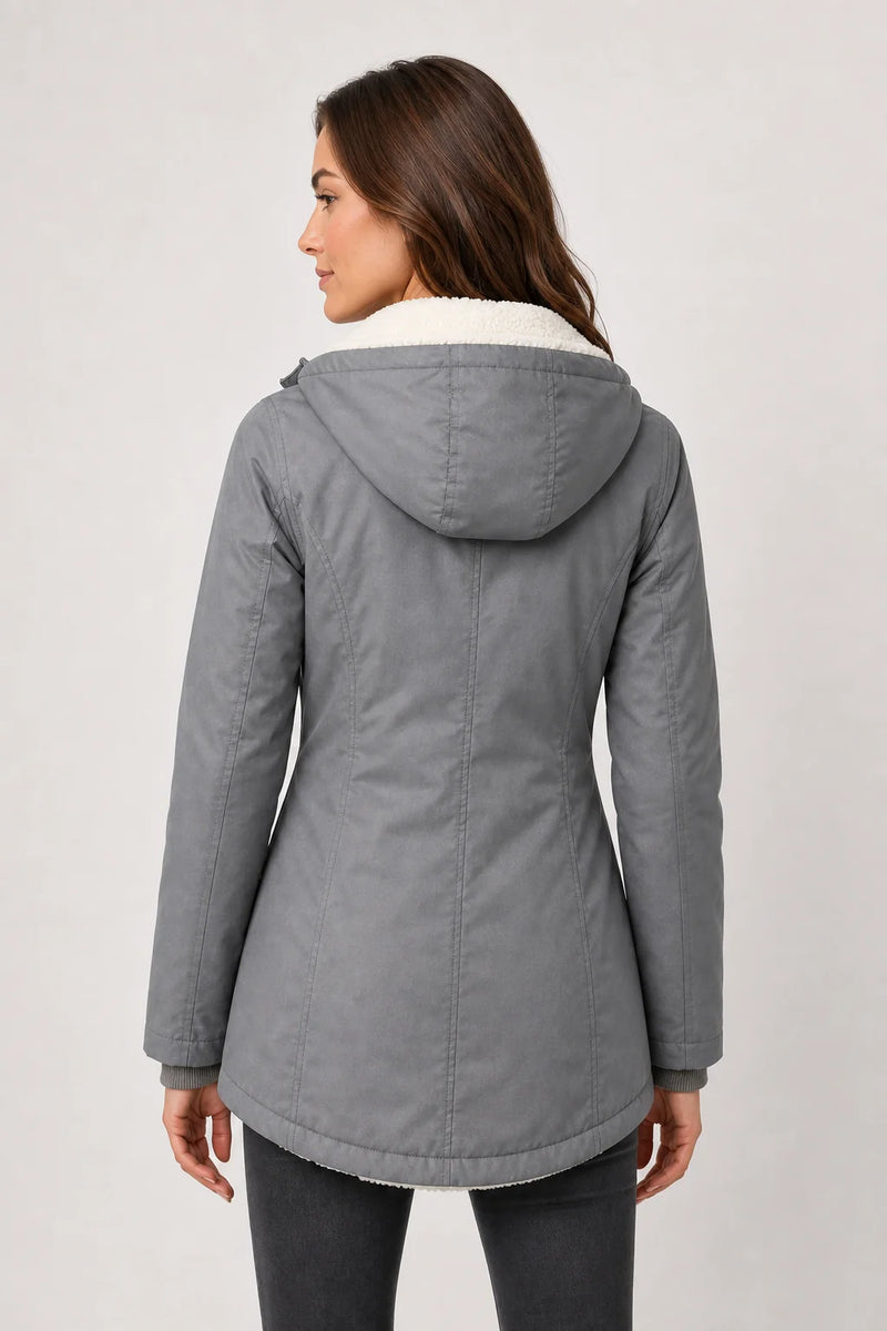 Sofaine Aria women's hooded waterproof winter parka in Gray, worn back view