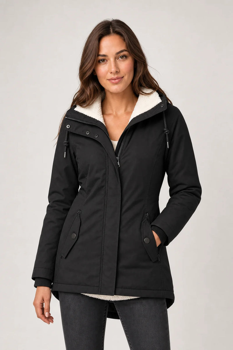 Sofaine Aria women's hooded waterproof winter parka in Black, worn front