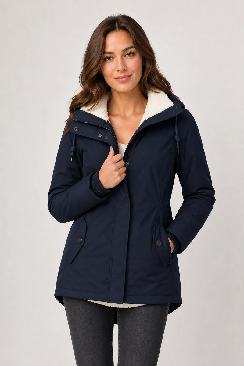 Sofaine Aria women's hooded waterproof winter parka in Navy Blue, worn front