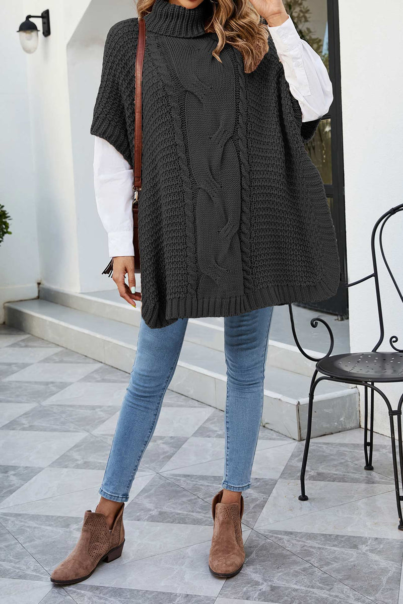 Turtleneck Poncho Sweater for Women with Cable Knit and Side Slits in Black, full length front view