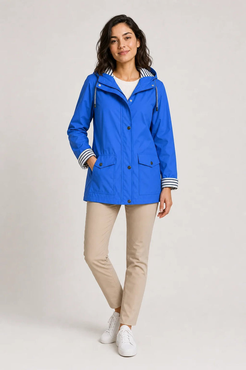 Sofaine Riley women's hooded rain jacket in Blue, worn front