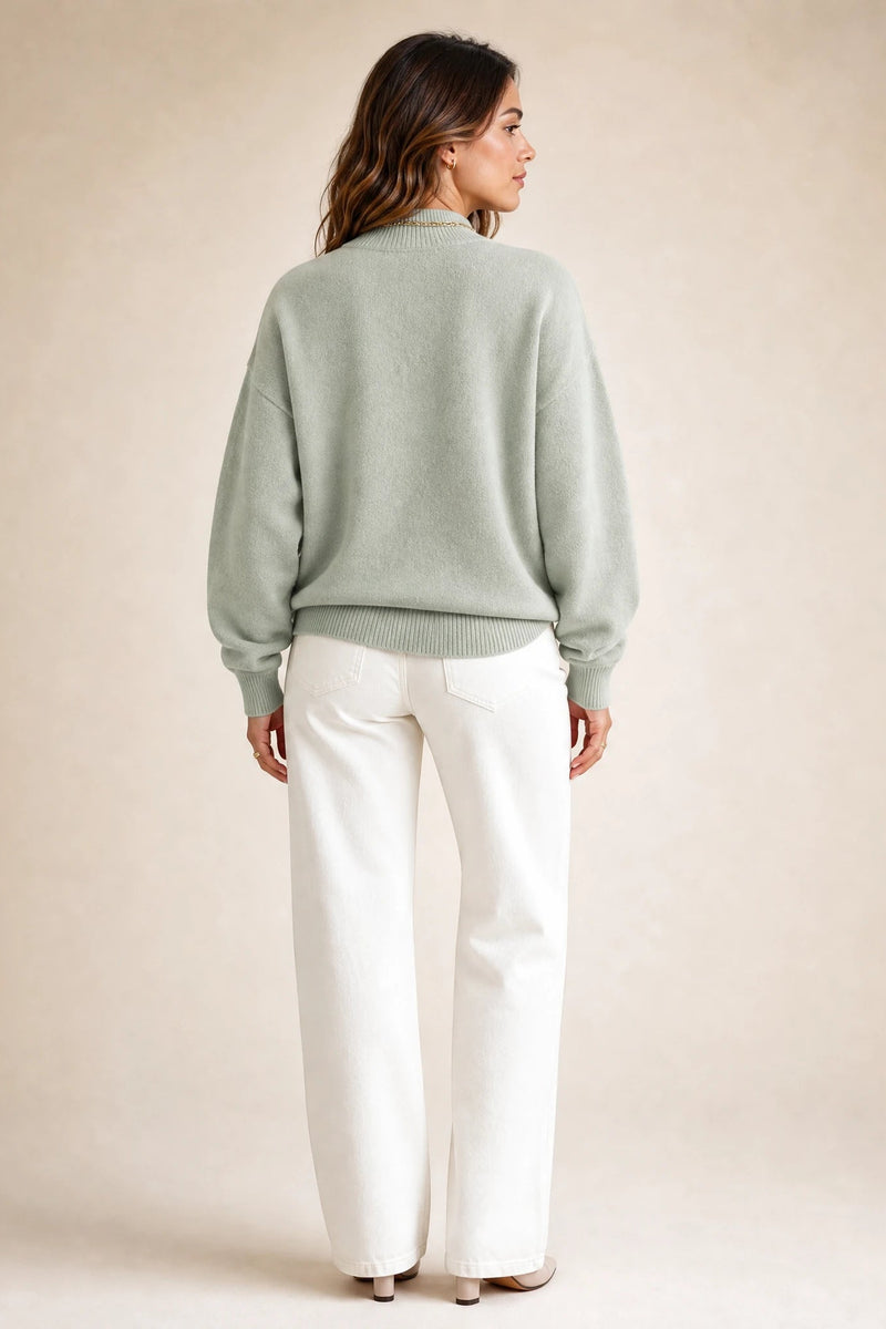Aubrey | Oversized Mock-Neck Sweater in Light Green, studio side view