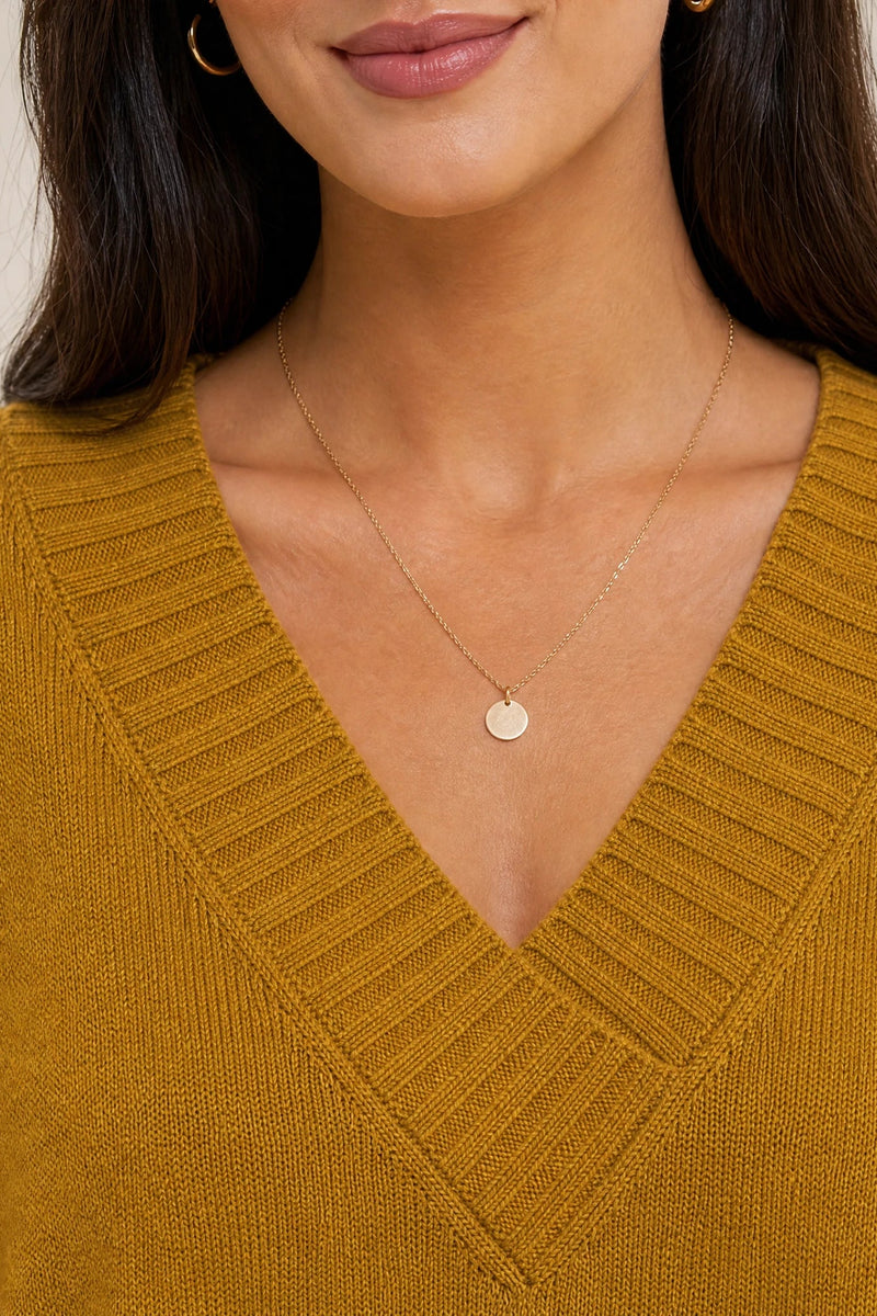 Avery | Cashmere-Feel V-Neck Sweater in Gold, fabric close-up