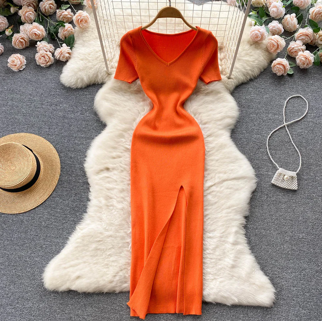 Camille | Lang ribstrikket strikkjole i Orange, flat lay