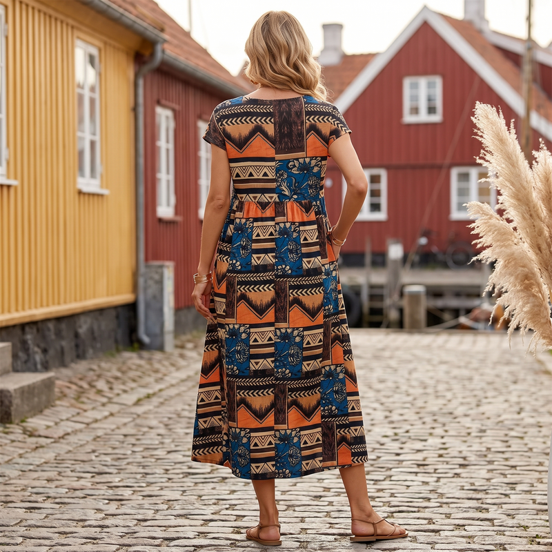 Signe | Printet midikjole med lommer i Orange, bagfra