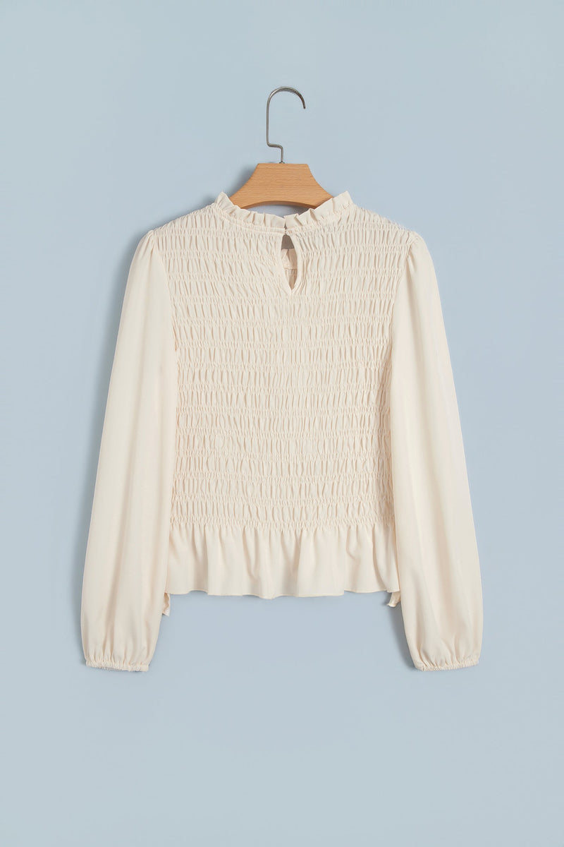 Smocked Peplum Blouse for Women with Ruffle Neck and Balloon Sleeves in Cream, front view