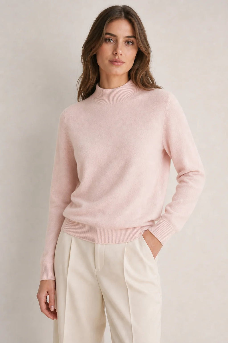 Sofaine Stella mock-neck knit sweater in pale pink with ribbed trims, worn front view