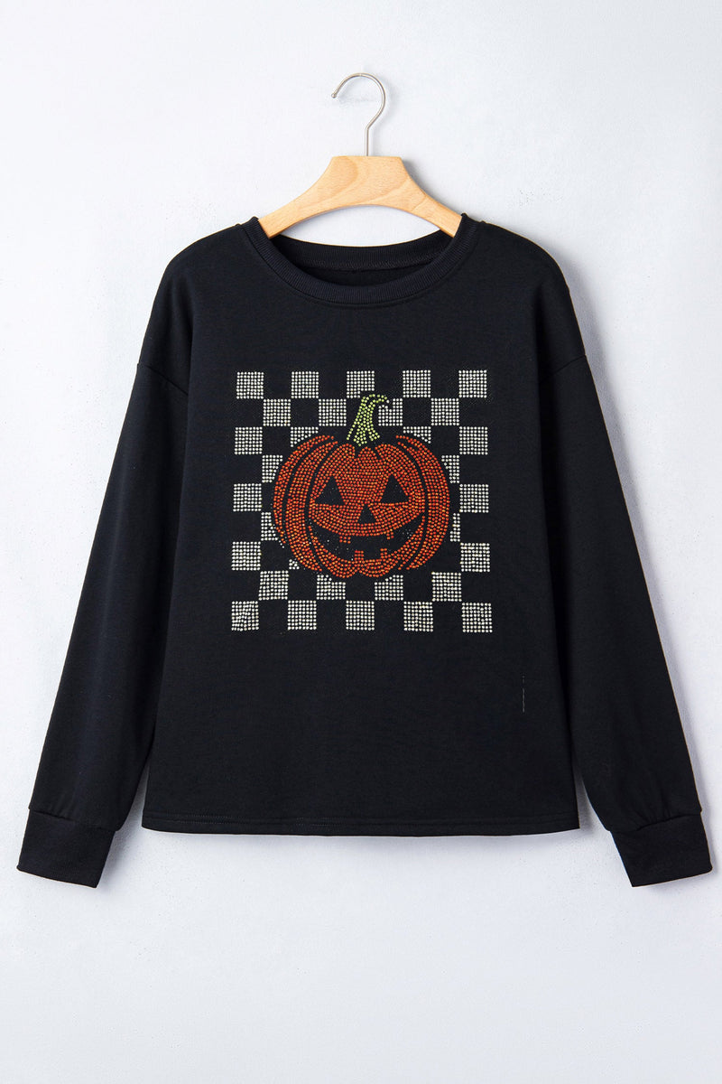 Rhinestone Pumpkin Long Sleeve Top for Women with Checkered Design in Black, front view on hanger