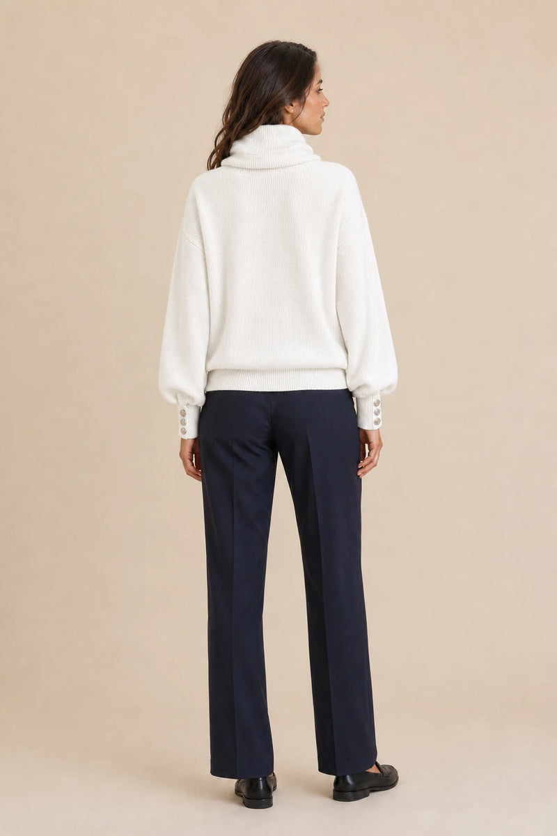 Ivory | Button-Cuff Turtleneck Sweater in White, studio back view