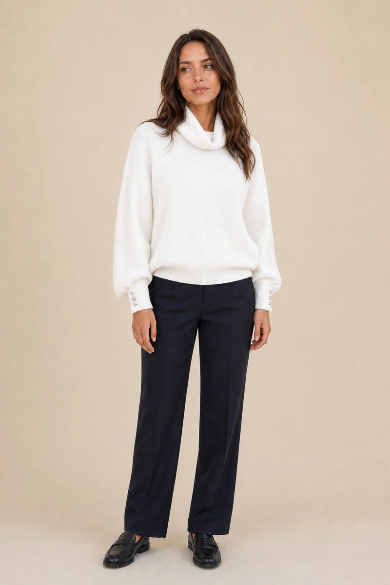 Ivory | Button-Cuff Turtleneck Sweater in White, studio front view