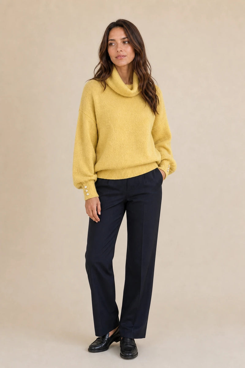 Ivory | Button-Cuff Turtleneck Sweater in Yellow, studio front view
