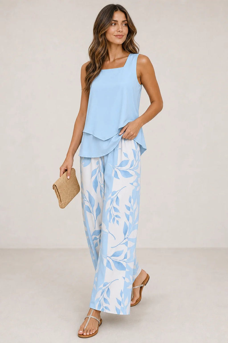 Sofaine Zoey light blue tank and leaf-print pants styled with a woven clutch, full look